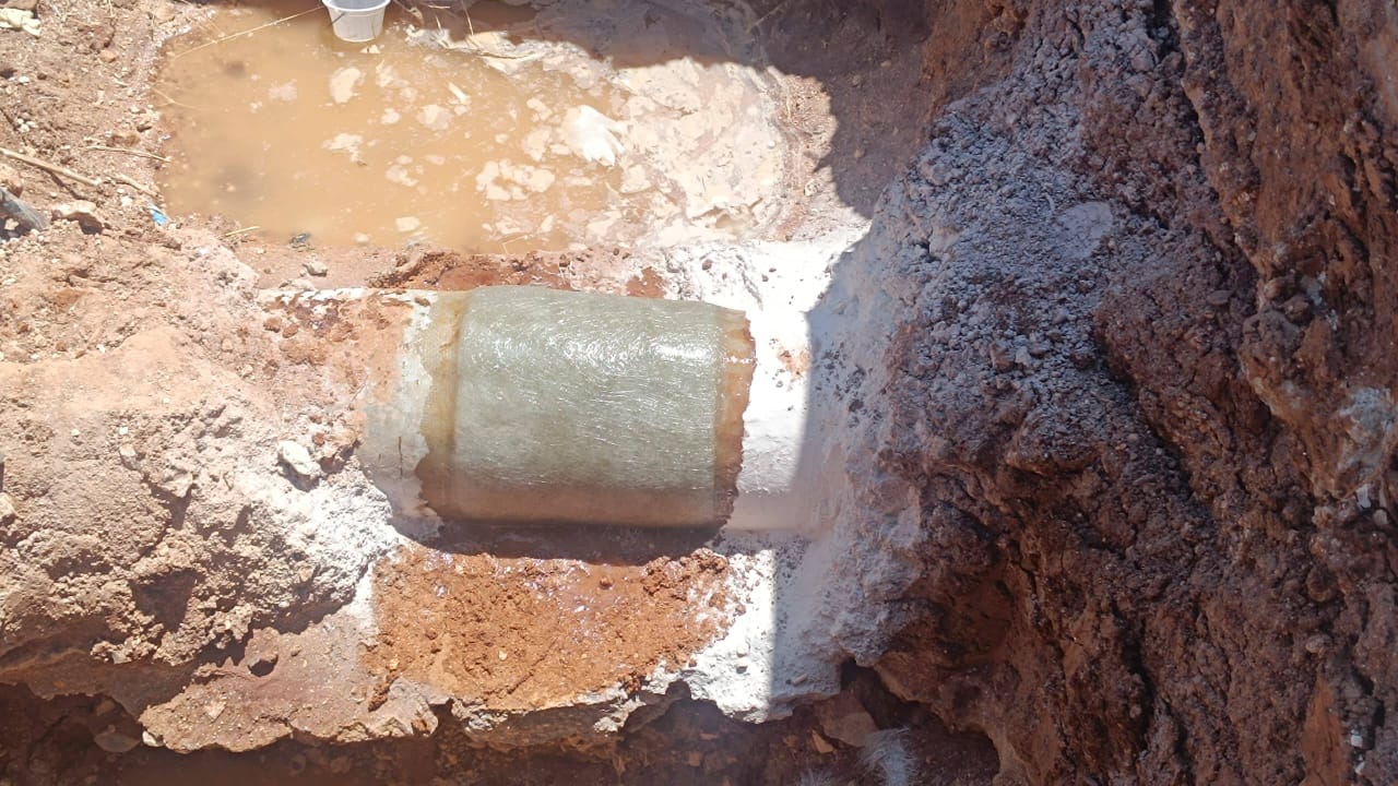 Repairing the GRP line feeding the PL2.2.3.5 line in the Southern Aleppo Plains irrigation project
