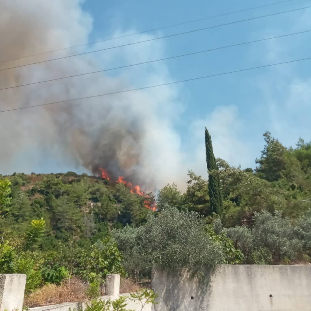 Controlling a fire near the Khabouria station in Latakia