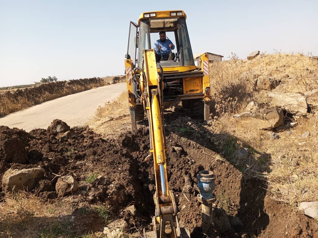 Clearing the blockage in the Ghadeer Al-Bustan network and restoring the irrigation water flow in Quneitra