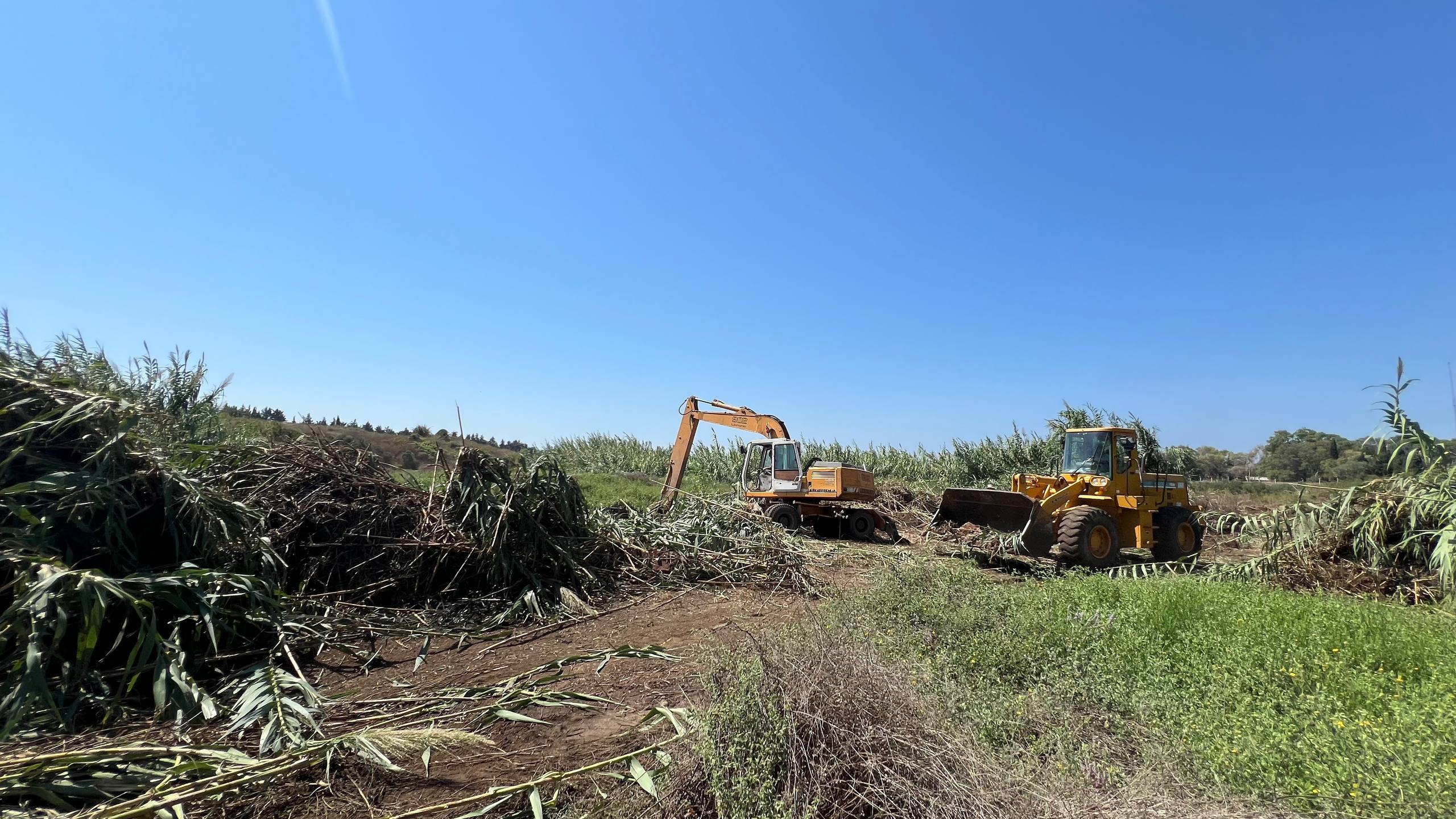 Clearing the Amrit River channel in preparation for winter and to protect the archaeological sites